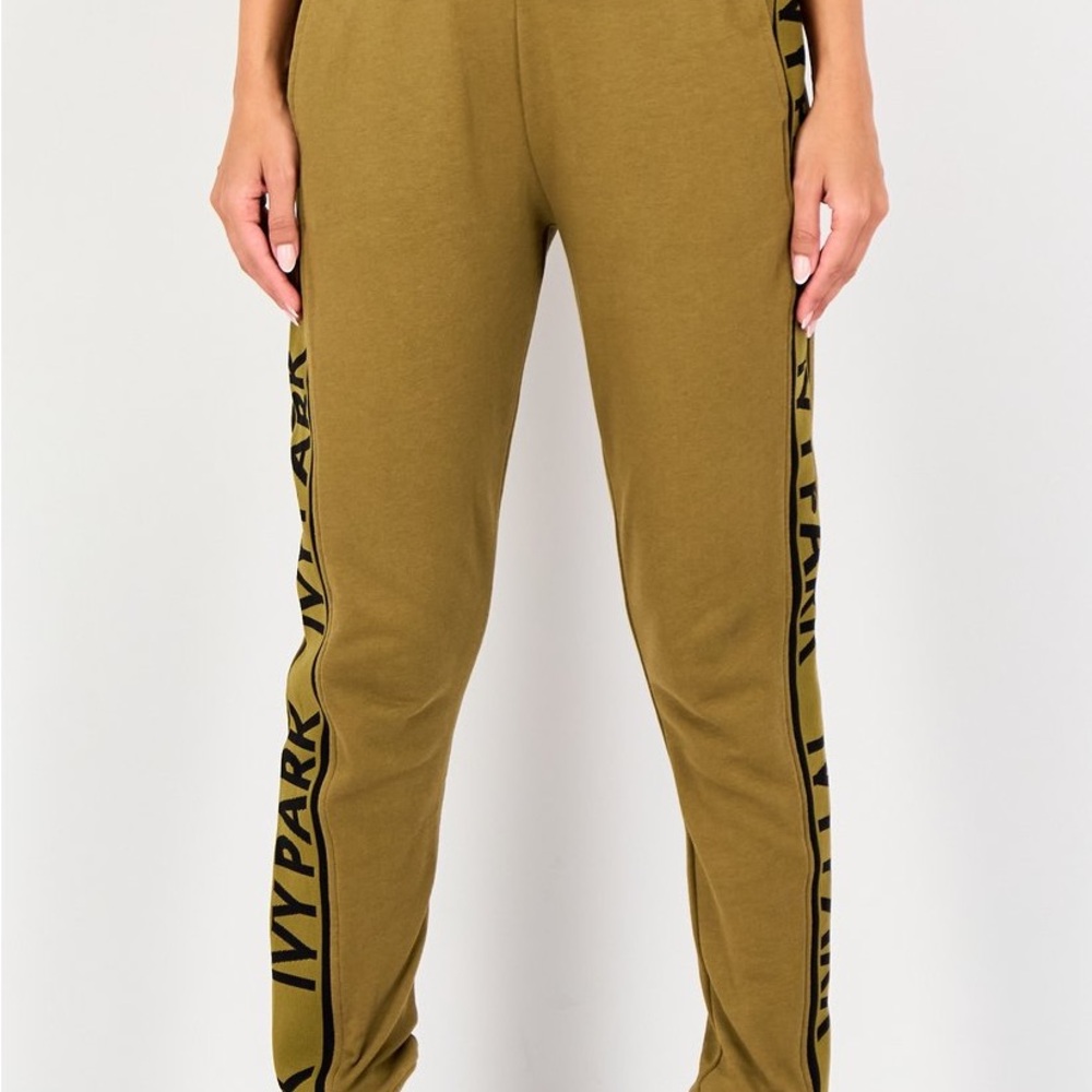 IVY PARK Mustard Joggers with Black Side Logo